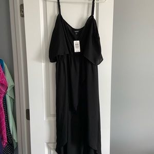 Black tong top, shorter in the front, cold shoulder adjustable strap